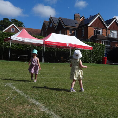 students playing with bubbles