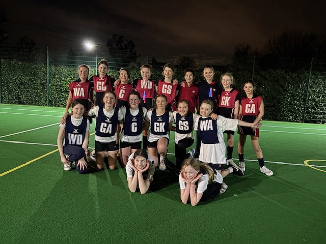 St Hilda's School U11 netball team take on alumni in a thrilling match under the floodlights