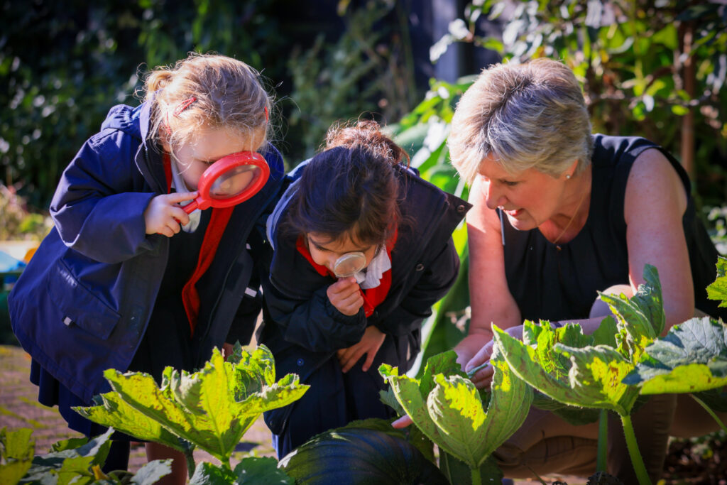 girls learning outdoors